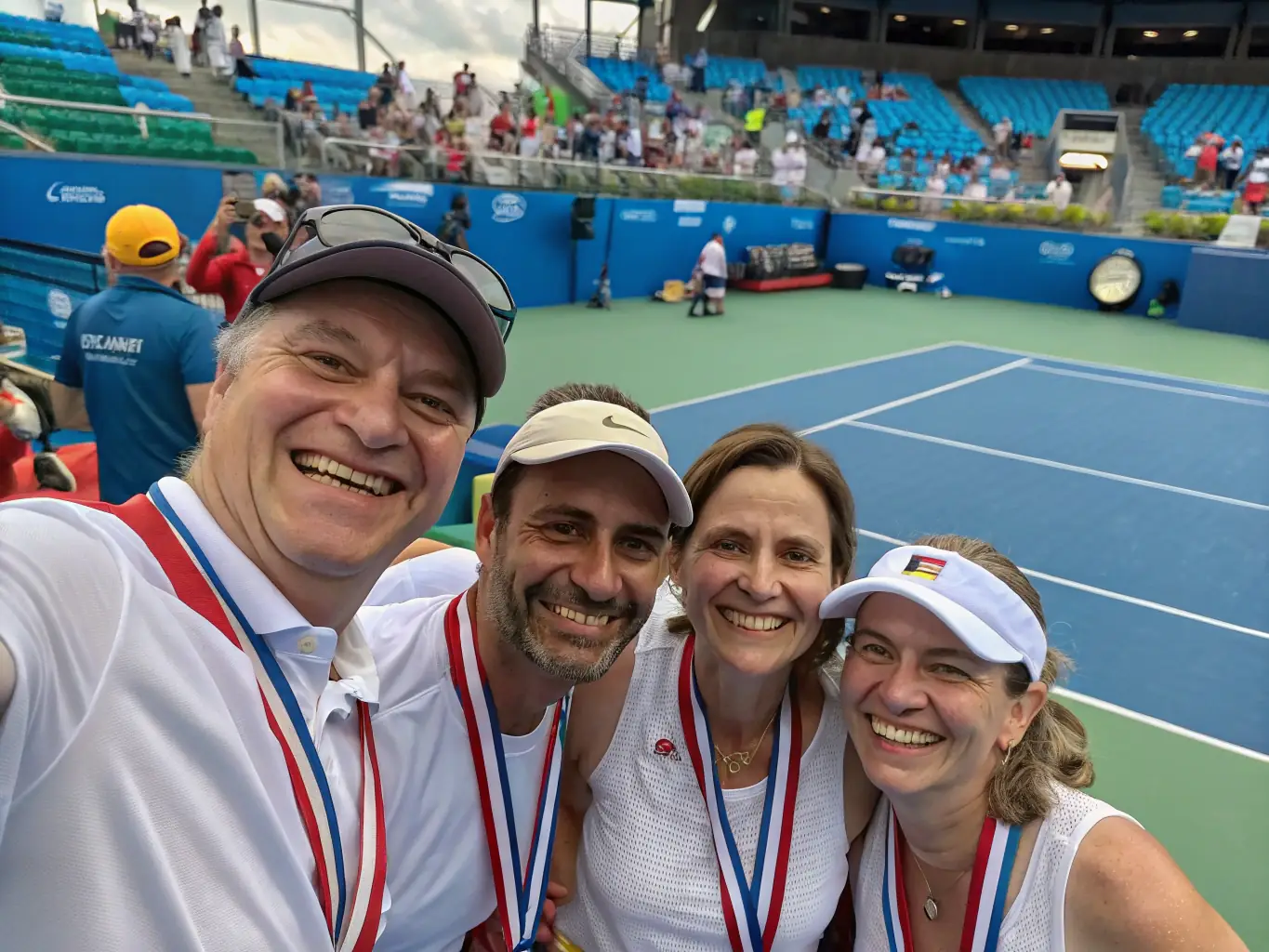 A heartwarming image of community members participating in a tennis-themed charity event, emphasizing K&A Tennis Club's commitment to giving back.